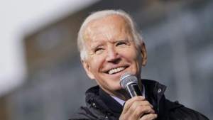 Joe Biden (with mic) - Getty