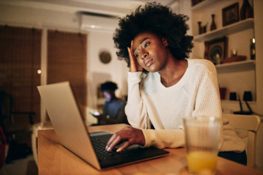 Overworked freelancer woman struggling with work