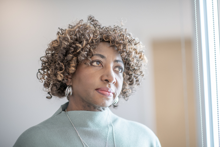 Senior Woman Feeling Lonely During the Coronavirus Pandemic Stock Photo